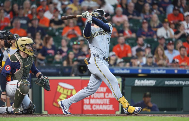 May 19, 2024; Houston, Texas, USA; Milwaukee Brewers second baseman Brice Turang (2) hits a double during the first inning against the Houston Astros at Minute Maid Park. Mandatory Credit: Troy Taormina-USA TODAY Sports