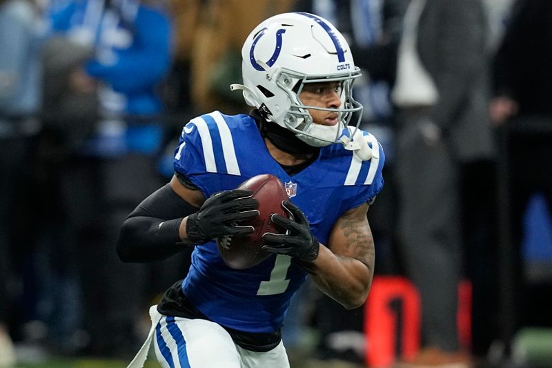 Indianapolis Colts wide receiver Josh Downs (1) warms up before an NFL football game against the Houston Texans, Saturday, Jan. 6, 2024, in Indianapolis. (AP Photo/Darron Cummings)