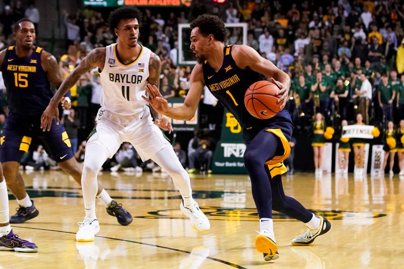 Feb 13, 2023; Waco, Texas, USA; West Virginia Mountaineers forward Emmitt Matthews Jr. (1) works past Baylor Bears forward Jalen Bridges (11) during the first half at Ferrell Center. Mandatory Credit: Raymond Carlin III-USA TODAY Sports