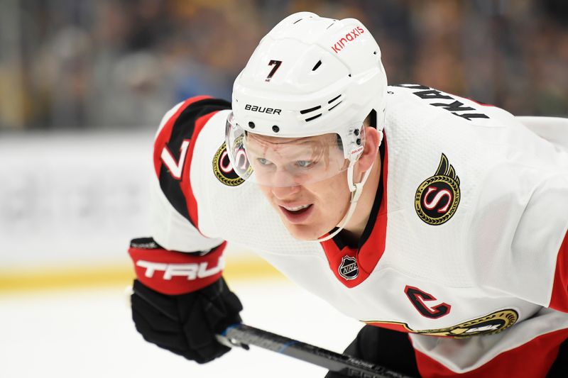 Apr 16, 2024; Boston, Massachusetts, USA;  Ottawa Senators left wing Brady Tkachuk (7) gets ready for a face off during the second period against the Boston Bruins at TD Garden. Mandatory Credit: Bob DeChiara-USA TODAY Sports