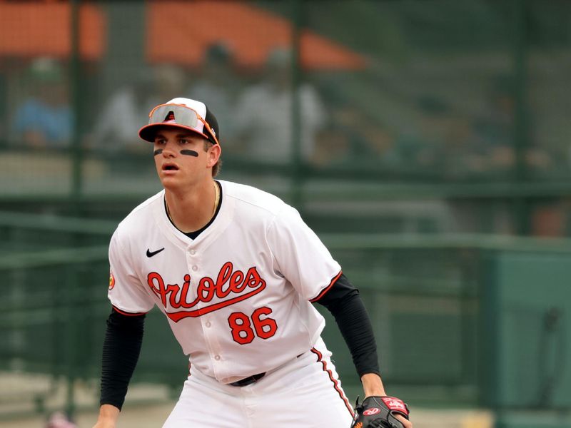 Mar 2, 2024; Sarasota, Florida, USA; Baltimore Orioles infielder Coby Mayo (86) looks on during the first inning against the New York Yankees at Ed Smith Stadium. Mandatory Credit: Kim Klement Neitzel-USA TODAY Sports