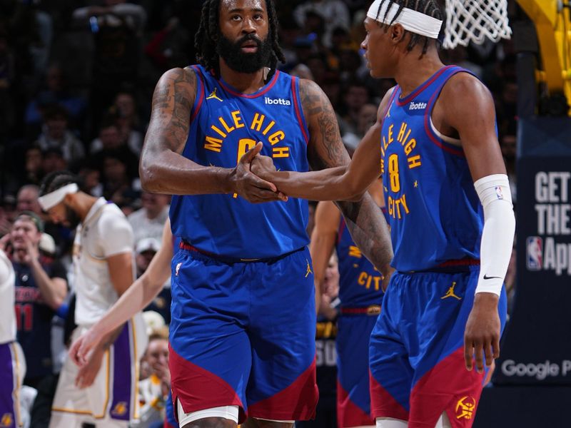 DENVER, CO - APRIL 20: DeAndre Jordan #6 and Peyton Watson #8 of the Denver Nuggets high five during the game against the Los Angeles Lakers during Round 1 Game 1 of the 2024 NBA Playoffs on April 20, 2024 at the Ball Arena in Denver, Colorado. NOTE TO USER: User expressly acknowledges and agrees that, by downloading and/or using this Photograph, user is consenting to the terms and conditions of the Getty Images License Agreement. Mandatory Copyright Notice: Copyright 2024 NBAE (Photo by Garrett Ellwood/NBAE via Getty Images)