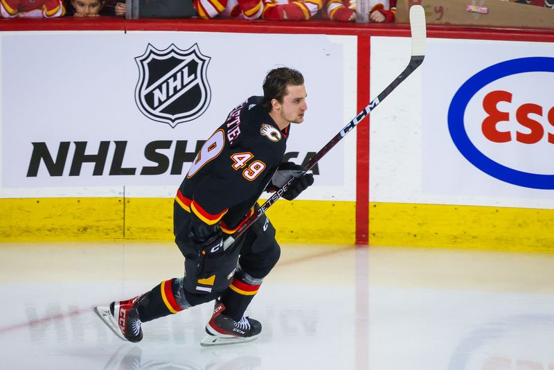 Jan 21, 2023; Calgary, Alberta, CAN; Calgary Flames left wing Jakob Pelletier (49) skates during the warmup period against the Tampa Bay Lightning at Scotiabank Saddledome. Mandatory Credit: Sergei Belski-USA TODAY Sports