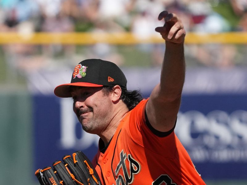 Feb 22, 2026; Scottsdale, Arizona, USA; San Francisco Giants pitcher Robbie Ray (38) throws against the Chicago Cubs in the first inning at Scottsdale Stadium. Mandatory Credit: Rick Scuteri-Imagn Images