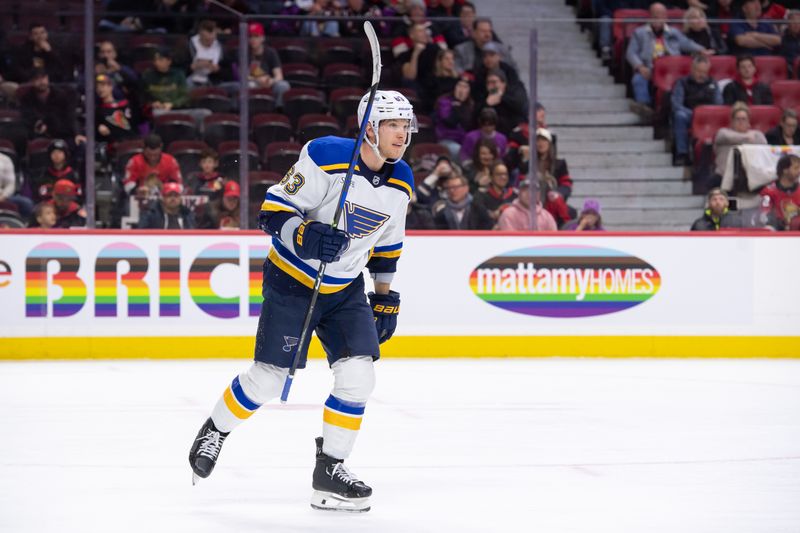 Mar 21, 2024; Ottawa, Ontario, CAN; St. Louis Blues left wing Jake Neighbours (63) skates to bench after scoring a goal in the second period against the Ottawa Senators at the Canadian Tire Centre. Mandatory Credit: Marc DesRosiers-USA TODAY Sports