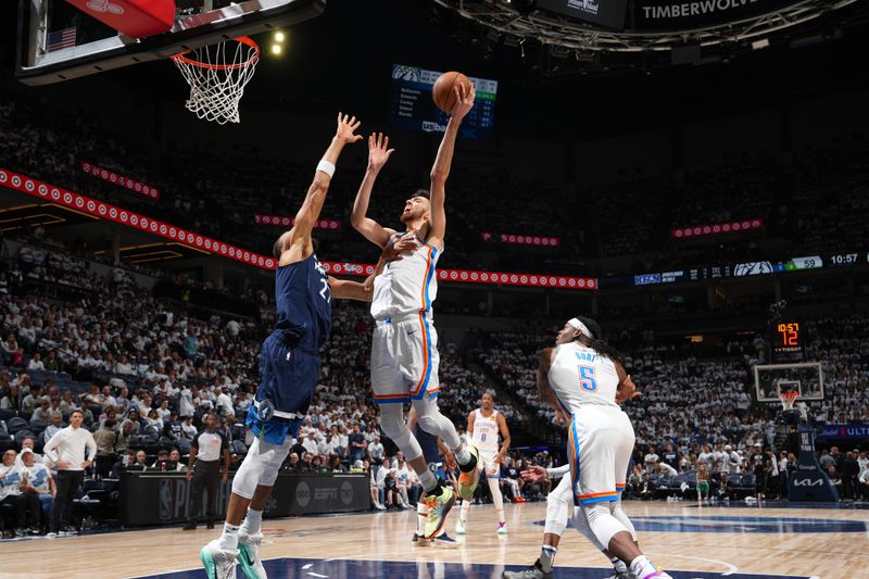 MINNEAPOLIS, MN - MAY 26: Chet Holmgren #7 of the Oklahoma City Thunder drives to the basket during the game against the Minnesota Timberwolves during Game 4 of the 2025 NBA Western Conference Finals on May 26, 2025 at Target Center in Minneapolis, Minnesota. NOTE TO USER: User expressly acknowledges and agrees that, by downloading and or using this Photograph, user is consenting to the terms and conditions of the Getty Images License Agreement. Mandatory Copyright Notice: Copyright 2025 NBAE (Photo by Jesse D. Garrabrant/NBAE via Getty Images)
