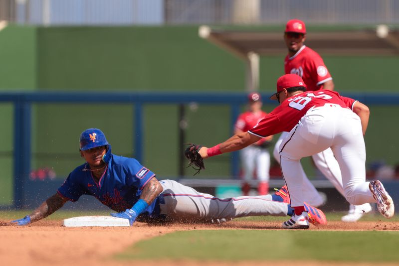 Mar 5, 2026; West Palm Beach, Florida, USA; New York Mets center fielder Cristian Pache (71) steals second base against Washington Nationals shortstop Seaver King (66) during the fourth inning at CACTI Park of the Palm Beaches. Mandatory Credit: Sam Navarro-Imagn Images