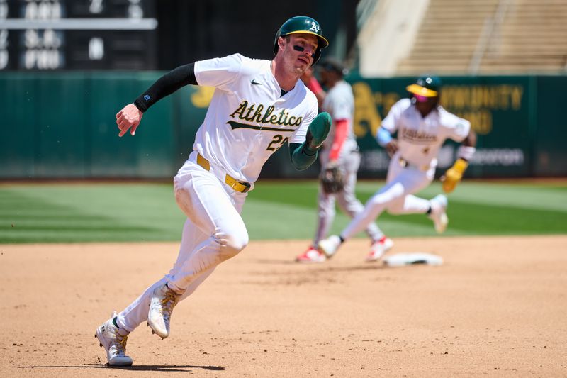 May 5, 2024; Oakland, California, USA; Oakland Athletics designated hitter Brent Rooker (25) and outfielder Lawrence Butler (4) run on an RBi single hit by infielder Darell Hernaiz (2) (not pictured) against the Miami Marlins during the fourth inning at Oakland-Alameda County Coliseum. Mandatory Credit: Robert Edwards-USA TODAY Sports