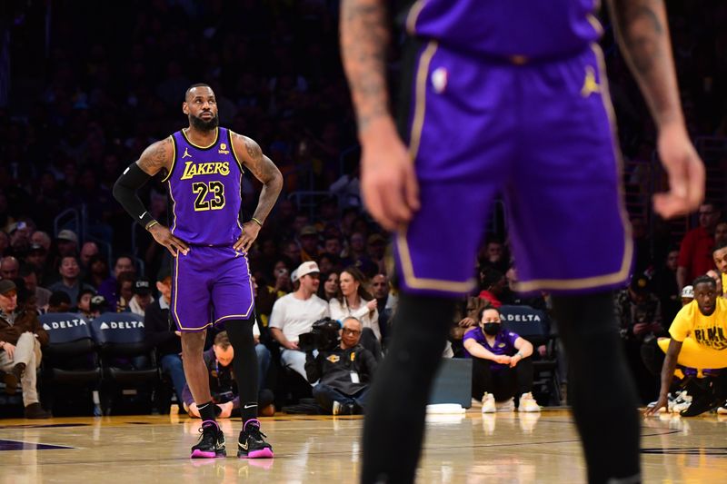 LOS ANGELES, CA - FEBRUARY 9:  LeBron James #23 of the Los Angeles Lakers looks on during the game against the New Orleans Pelicans on February 9, 2024 at Crypto.Com Arena in Los Angeles, California. NOTE TO USER: User expressly acknowledges and agrees that, by downloading and/or using this Photograph, user is consenting to the terms and conditions of the Getty Images License Agreement. Mandatory Copyright Notice: Copyright 2024 NBAE (Photo by Adam Pantozzi/NBAE via Getty Images)