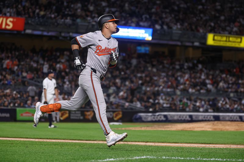 Sep 24, 2024; Bronx, New York, USA; Baltimore Orioles third baseman Ramon Urias (29) runs the bases after his solo home run during the seventh inning against the New York Yankees at Yankee Stadium. Mandatory Credit: Vincent Carchietta-Imagn Images