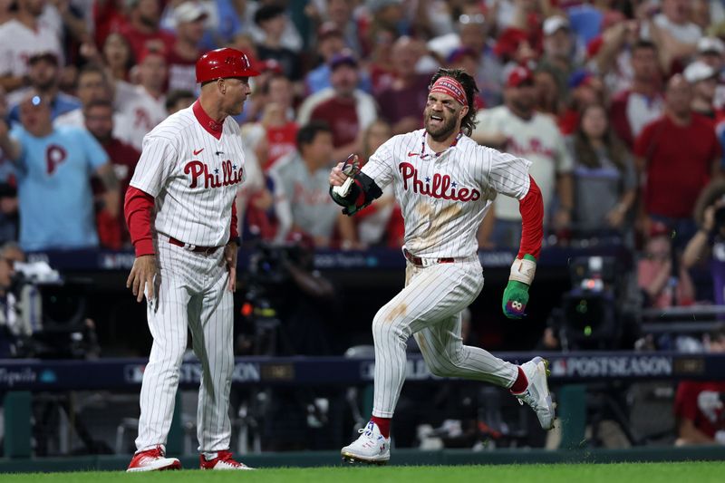 Oct 3, 2023; Philadelphia, Pennsylvania, USA; Philadelphia Phillies designated hitter Bryce Harper (3) runs toward home plate to score a run against the Miami Marlins in the eighth inning for game one of the Wildcard series for the 2023 MLB playoffs at Citizens Bank Park. Mandatory Credit: Bill Streicher-USA TODAY Sports