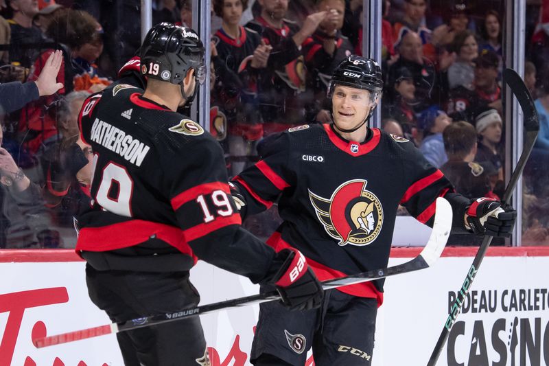 Mar 24, 2024; Ottawa, Ontario, CAN; Ottawa Senators defenseman Jakob Chychrun (6) celebrates with right wing Drake Batherson (19) his goal scored against the Edmonton Oilers in the first period at the Canadian Tire Centre. Mandatory Credit: Marc DesRosiers-USA TODAY Sports