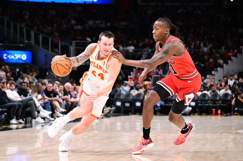 ATLANTA, GA - NOVEMBER 9: Garrison Mathews #24 of the Atlanta Hawks dribbles the ball during the game against the Chicago Bulls on November 9, 2024 at State Farm Arena in Atlanta, Georgia.  NOTE TO USER: User expressly acknowledges and agrees that, by downloading and/or using this Photograph, user is consenting to the terms and conditions of the Getty Images License Agreement. Mandatory Copyright Notice: Copyright 2024 NBAE (Photo by Adam Hagy/NBAE via Getty Images)