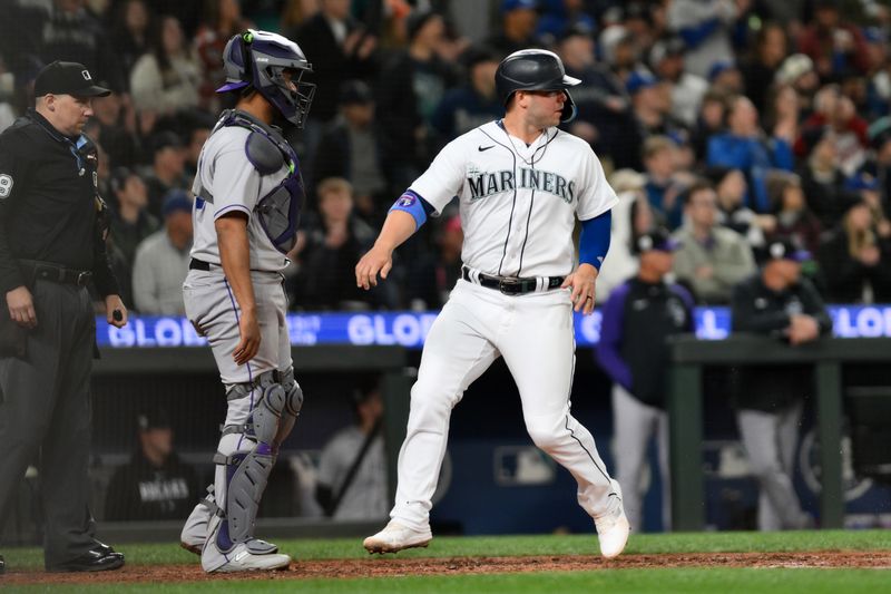 Apr 15, 2023; Seattle, Washington, USA; Seattle Mariners first baseman Ty France (23) scores a run off an RBI single hit by Seattle Mariners right fielder Teoscar Hernandez (35) (not pictured) during the sixth inning at T-Mobile Park. Mandatory Credit: Steven Bisig-USA TODAY Sports