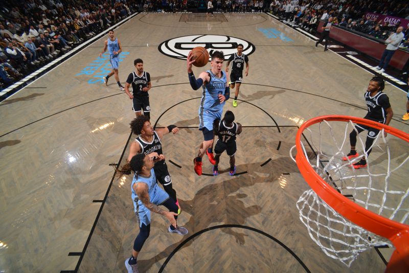 BROOKLYN, NY - NOVEMBER 4: Jake LaRavia #3 of the Memphis Grizzlies drives to the basket during the game against the Brooklyn Nets on November 4, 2024 at Barclays Center in Brooklyn, New York. NOTE TO USER: User expressly acknowledges and agrees that, by downloading and or using this Photograph, user is consenting to the terms and conditions of the Getty Images License Agreement. Mandatory Copyright Notice: Copyright 2024 NBAE (Photo by Jesse D. Garrabrant/NBAE via Getty Images)