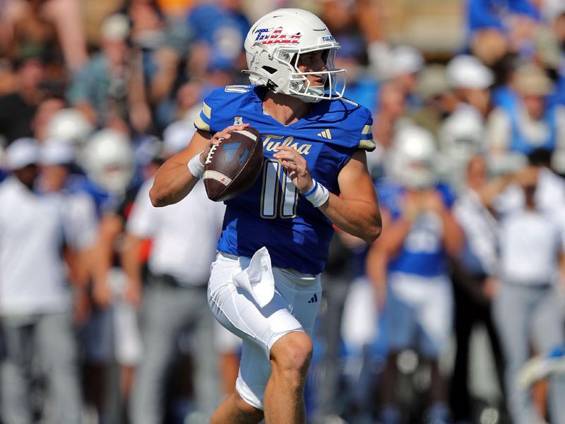 Oct 5, 2024; Tulsa, Oklahoma, USA; Tulsa Golden Hurricane quarterback Kirk Francis (11) looks to pass against the Army Black Knights during the first half at Skelly Field at H.A. Chapman Stadium. Mandatory Credit: Danny Wild-Imagn Images