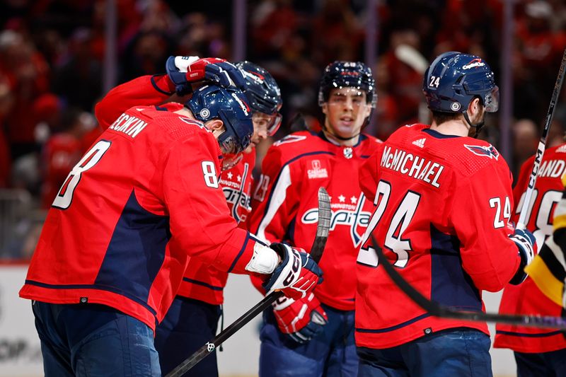 Apr 4, 2024; Washington, District of Columbia, USA; Washington Capitals left wing Alex Ovechkin (8) celebrates with teammates after scoring a goal against the Pittsburgh Penguins in the third period at Capital One Arena. Mandatory Credit: Geoff Burke-USA TODAY Sports