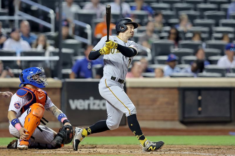 Aug 15, 2023; New York City, New York, USA; Pittsburgh Pirates left fielder Bryan Reynolds (10) follows through on an RBI triple against the New York Mets during the seventh inning at Citi Field. Mandatory Credit: Brad Penner-USA TODAY Sports