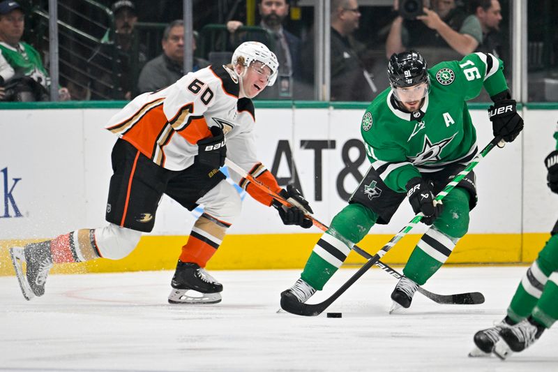 Jan 25, 2024; Dallas, Texas, USA; Dallas Stars center Tyler Seguin (91) skates past Anaheim Ducks defenseman Jackson LaCombe (60) during the first period at the American Airlines Center. Mandatory Credit: Jerome Miron-USA TODAY Sports