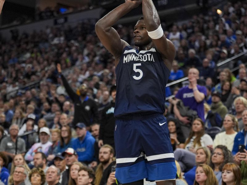 MINNEAPOLIS, MN -  NOVEMBER 10:  Anthony Edwards #5 of the Minnesota Timberwolves shoots a three point basket during the game against the Miami Heat on November 10, 2024 at Target Center in Minneapolis, Minnesota. NOTE TO USER: User expressly acknowledges and agrees that, by downloading and or using this Photograph, user is consenting to the terms and conditions of the Getty Images License Agreement. Mandatory Copyright Notice: Copyright 2024 NBAE (Photo by Jordan Johnson/NBAE via Getty Images)