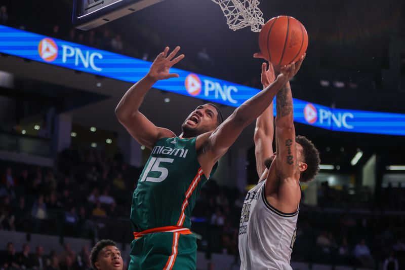 Jan 4, 2023; Atlanta, Georgia, USA; Miami Hurricanes forward Norchad Omier (15) shoots against the Georgia Tech Yellow Jackets in the first half at McCamish Pavilion. Mandatory Credit: Brett Davis-USA TODAY Sports