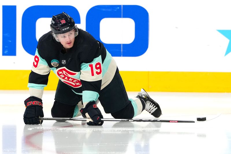 Mar 21, 2024; Las Vegas, Nevada, USA; Seattle Kraken left wing Jared McCann (19) warms up before a game against the Vegas Golden Knights at T-Mobile Arena. Mandatory Credit: Stephen R. Sylvanie-USA TODAY Sports