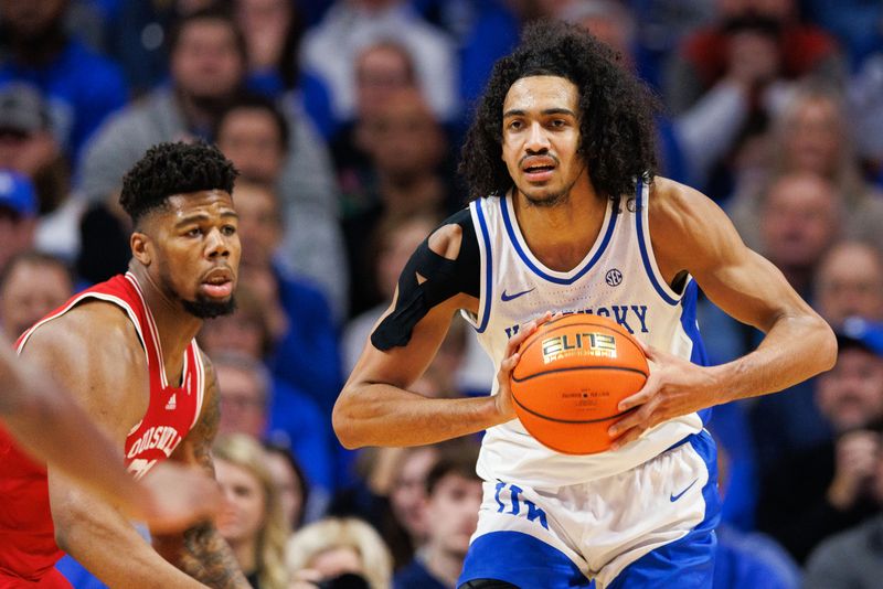 Dec 31, 2022; Lexington, Kentucky, USA; Kentucky Wildcats forward Jacob Toppin (0) passes the ball during the first half against the Louisville Cardinals at Rupp Arena at Central Bank Center. Mandatory Credit: Jordan Prather-USA TODAY Sports