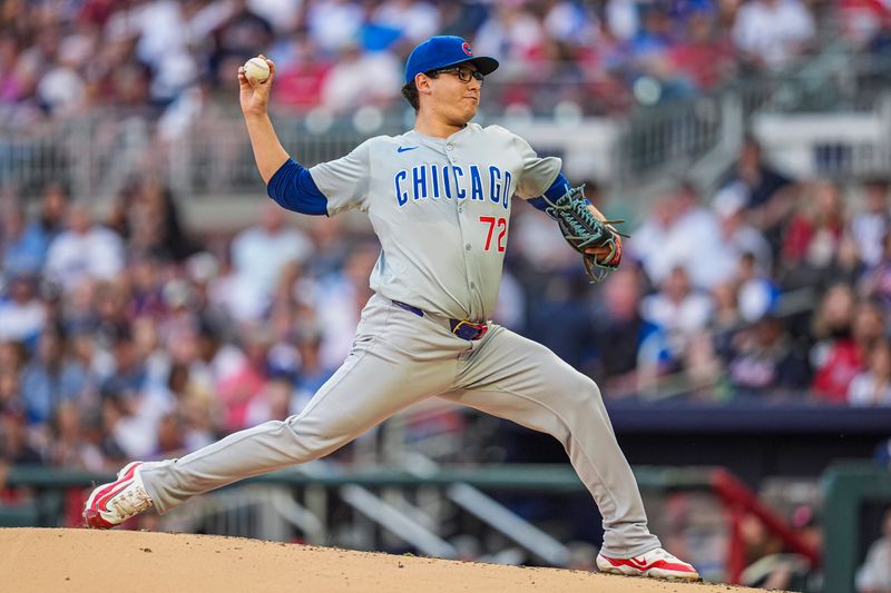 May 15, 2024; Cumberland, Georgia, USA; Chicago Cubs starting pitcher Javier Assad (72) pitches against the Atlanta Braves during the first inning at Truist Park. Mandatory Credit: Dale Zanine-USA TODAY Sports