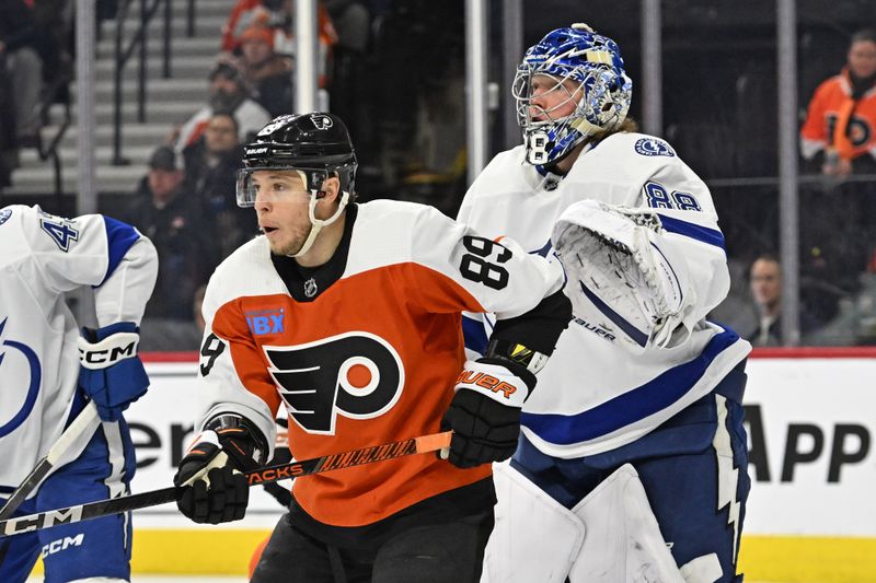 Jan 23, 2024; Philadelphia, Pennsylvania, USA; Philadelphia Flyers right wing Cam Atkinson (89) stands in front of Tampa Bay Lightning goaltender Andrei Vasilevskiy (88) during the first period at Wells Fargo Center. Mandatory Credit: Eric Hartline-USA TODAY Sports