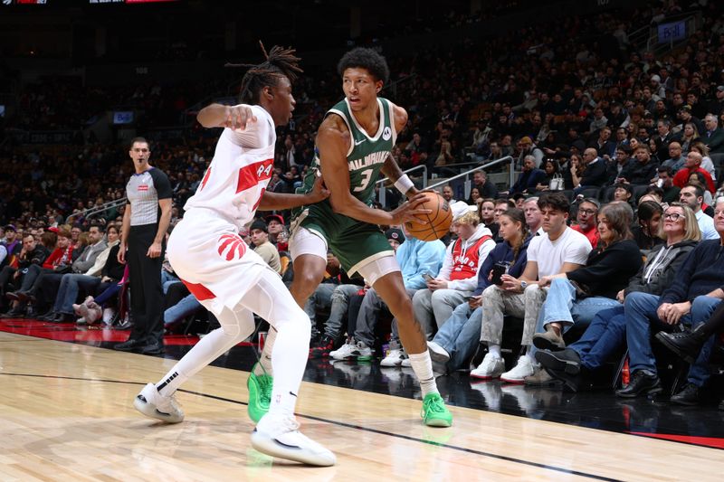 TORONTO, CANADA - JANUARY 6: MarJon Beauchamp #3 of the Milwaukee Bucks looks to pass the ball during the game against the Toronto Raptors on January 6, 2025 at the Scotiabank Arena in Toronto, Ontario, Canada.  NOTE TO USER: User expressly acknowledges and agrees that, by downloading and or using this Photograph, user is consenting to the terms and conditions of the Getty Images License Agreement.  Mandatory Copyright Notice: Copyright 2025 NBAE (Photo by Vaughn Ridley/NBAE via Getty Images)