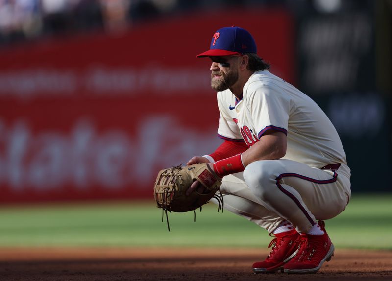 Oct 5, 2024; Philadelphia, PA, USA;  Philadelphia Phillies first baseman Bryce Harper (3) in action against the New York Mets in game one of the NLDS for the 2024 MLB Playoffs at Citizens Bank Park. Mandatory Credit: Bill Streicher-Imagn Images