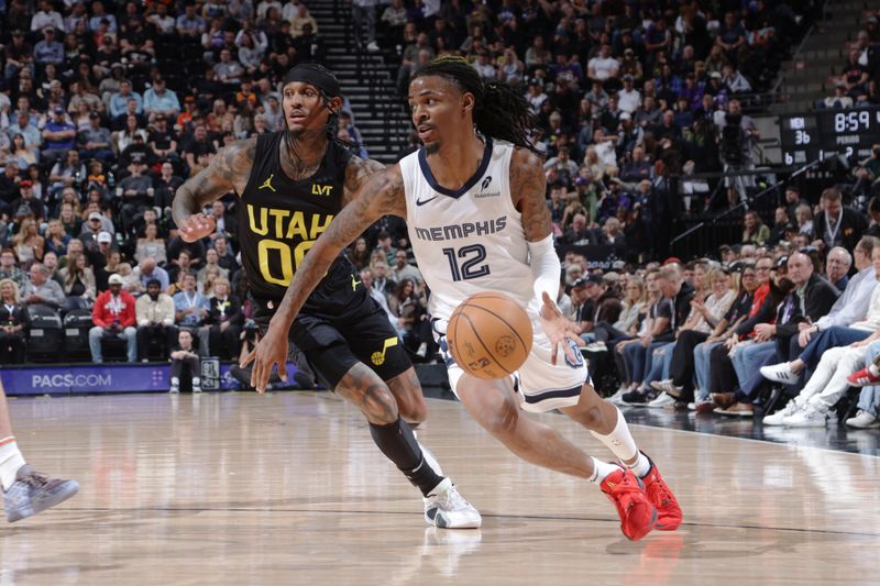 SALT LAKE CITY, UT - OCTOBER 23: Ja Morant #12 of the Memphis Grizzlies dribbles the ball during the game against the Utah Jazz on OCTOBER 23, 2024 at vivint.SmartHome Arena in Salt Lake City, Utah. NOTE TO USER: User expressly acknowledges and agrees that, by downloading and or using this Photograph, User is consenting to the terms and conditions of the Getty Images License Agreement. Mandatory Copyright Notice: Copyright 2024 NBAE (Photo by Melissa Majchrzak/NBAE via Getty Images)