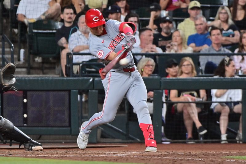 May 14, 2024; Phoenix, Arizona, USA;  Cincinnati Reds outfielder Stuart Fairchild (17) hits a RBI single in the sixth inning Arizona Diamondbacks at Chase Field. Mandatory Credit: Matt Kartozian-USA TODAY Sports