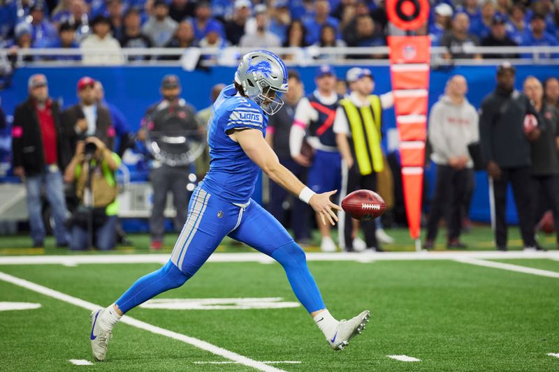 Detroit Lions punter Jack Fox (3) punts against the Tampa Bay Buccaneers during an NFL divisional round playoff football game, Sunday, Jan. 21, 2024, in Detroit. (AP Photo/Rick Osentoski)