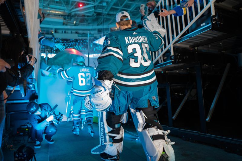 Dec 21, 2023; San Jose, California, USA; San Jose Sharks goaltender Kaapo Kahkonen (36) high fives fans before the start of the first period against the Arizona Coyotes at SAP Center at San Jose. Mandatory Credit: Stan Szeto-USA TODAY Sports