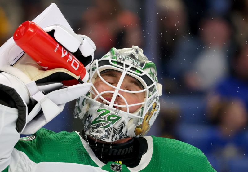 Mar 9, 2023; Buffalo, New York, USA;  Dallas Stars goaltender Jake Oettinger (29) gets a ring during a stoppage in play against the Buffalo Sabres during the second period at KeyBank Center. Mandatory Credit: Timothy T. Ludwig-USA TODAY Sports