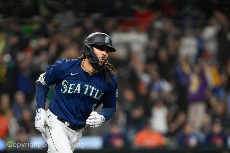 Sep 27, 2023; Seattle, Washington, USA; Seattle Mariners shortstop J.P. Crawford (3) runs toward first base after hitting a home run against the Houston Astros during the first inning at T-Mobile Park. Mandatory Credit: Steven Bisig-USA TODAY Sports