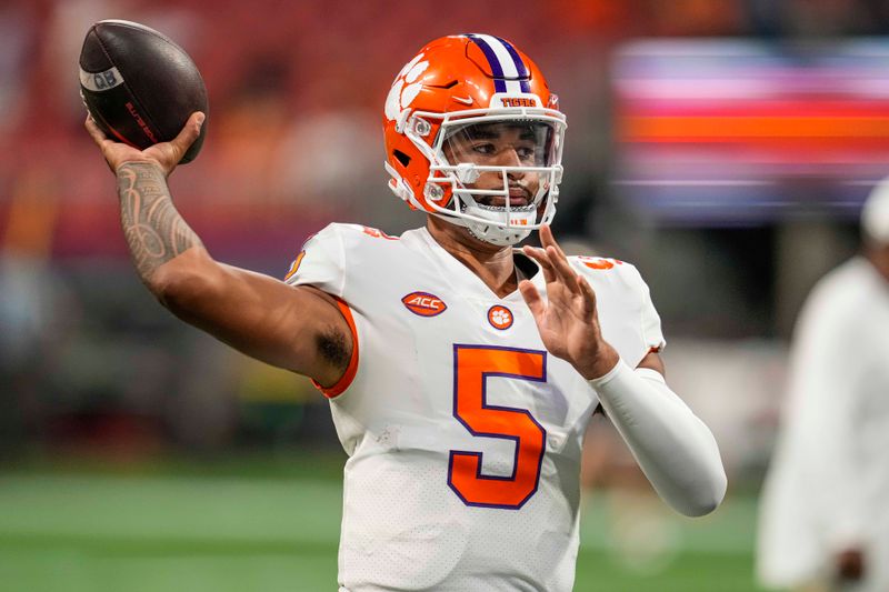 Sep 5, 2022; Atlanta, Georgia, USA; Clemson Tigers quarterback DJ Uiagalelei (5) warms up on the field prior to the game against the Georgia Tech Yellow Jackets at Mercedes-Benz Stadium. Mandatory Credit: Dale Zanine-USA TODAY Sports