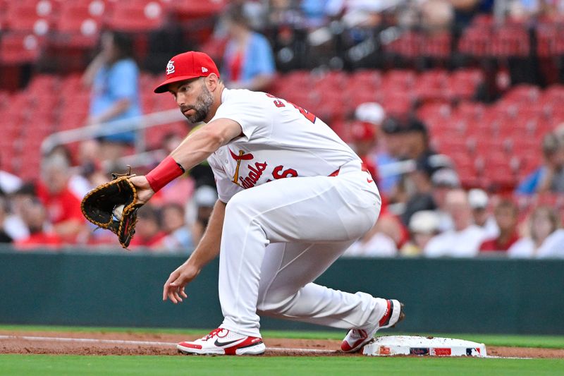 Aug 6, 2024; St. Louis, Missouri, USA;  St. Louis Cardinals first baseman Paul Goldschmidt (46) catches a throw against the Tampa Bay Rays during the first inning at Busch Stadium. Mandatory Credit: Jeff Curry-USA TODAY Sports