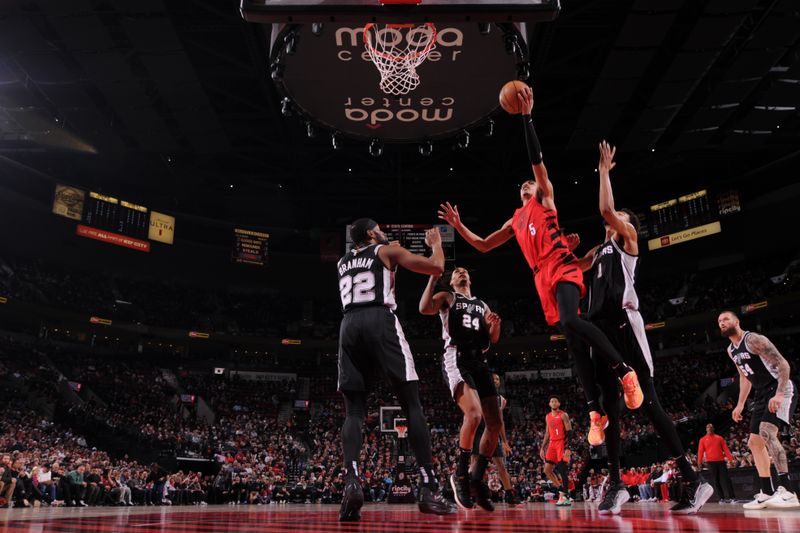 PORTLAND, OR - DECEMBER 13: Dalano Banton #5 of the Portland Trail Blazers drives to the basket during the game against the San Antonio Spurs on December 13, 2024 at the Moda Center Arena in Portland, Oregon. NOTE TO USER: User expressly acknowledges and agrees that, by downloading and or using this photograph, user is consenting to the terms and conditions of the Getty Images License Agreement. Mandatory Copyright Notice: Copyright 2024 NBAE (Photo by Cameron Browne/NBAE via Getty Images)