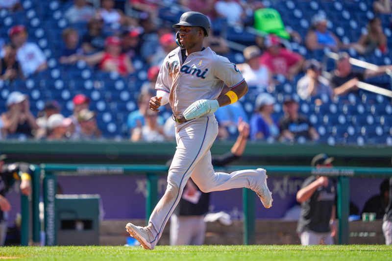 Sep 3, 2023; Washington, District of Columbia, USA;  Miami Marlins right fielder Jesus Sanchez (7) scores on an error by the Washington Nationals during the sixth inning at Nationals Park. Mandatory Credit: Gregory Fisher-USA TODAY Sports