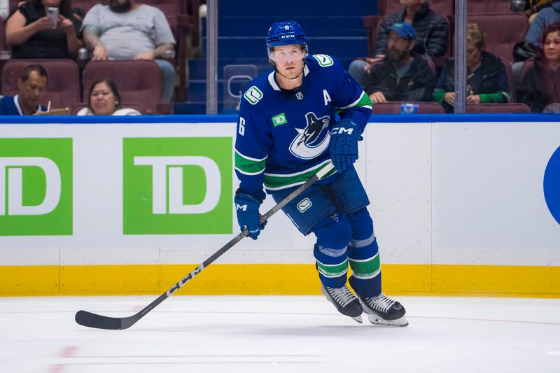 Sep 24, 2024; Vancouver, British Columbia, CAN; Vancouver Canucks forward Brock Boeser (6) skates against the Seattle Kraken during the second period at Rogers Arena. Mandatory Credit: Bob Frid-Imagn Images