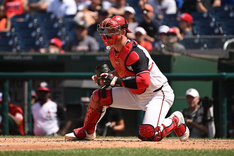 Jul 7, 2024; Washington, District of Columbia, USA; Washington Nationals catcher Riley Adams (15) blocks the plate after a play against the St. Louis Cardinals during the fifth inning at Nationals Park. Mandatory Credit: Rafael Suanes-USA TODAY Sports