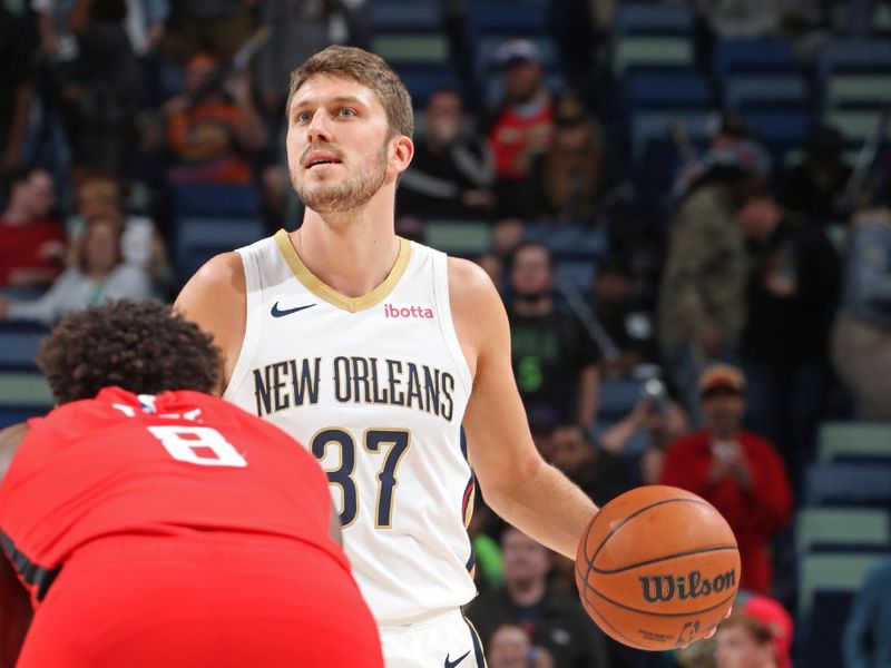 NEW ORLEANS, LA - FEBRUARY 22: Matt Ryan #37 of the New Orleans Pelicans dribbles the ball during the game against the Houston Rockets on February 22, 2024 at the Smoothie King Center in New Orleans, Louisiana. NOTE TO USER: User expressly acknowledges and agrees that, by downloading and or using this Photograph, user is consenting to the terms and conditions of the Getty Images License Agreement. Mandatory Copyright Notice: Copyright 2024 NBAE (Photo by Layne Murdoch Jr./NBAE via Getty Images)