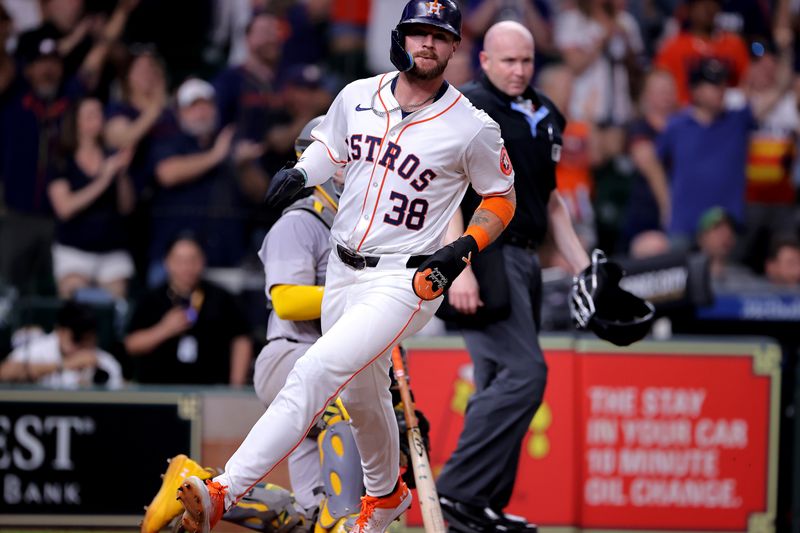 May 14, 2024; Houston, Texas, USA; Houston Astros pinch runner Trey Cabbage (38) crosses home plate to score the game-winning run against the Oakland Athletics during the tenth inning at Minute Maid Park. Mandatory Credit: Erik Williams-USA TODAY Sports