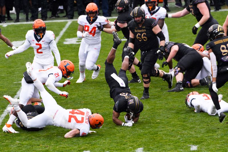 Dec 12, 2020; Evanston, Illinois, USA; Northwestern Wildcats running back Cam Porter (20) runs against the Illinois Fighting Illini during the first half at Ryan Field. Mandatory Credit: David Banks-USA TODAY Sports