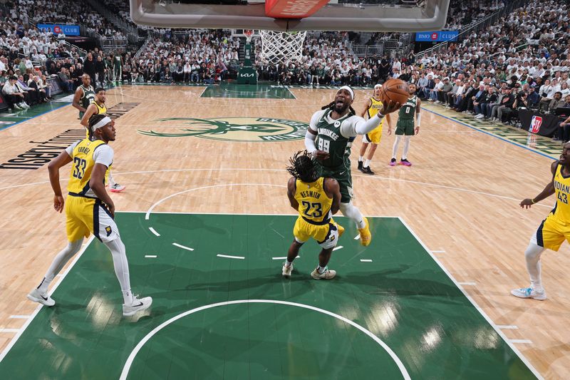 MILWAUKEE, WI - APRIL 23: Jae Crowder #99 of the Milwaukee Bucks drives to the basket during Round 1 Game 2 of the 2024 NBA Playoffs against the Indiana Pacers on April 23, 2024 at the Fiserv Forum Center in Milwaukee, Wisconsin. NOTE TO USER: User expressly acknowledges and agrees that, by downloading and or using this Photograph, user is consenting to the terms and conditions of the Getty Images License Agreement. Mandatory Copyright Notice: Copyright 2024 NBAE (Photo by Jeff Haynes/NBAE via Getty Images).