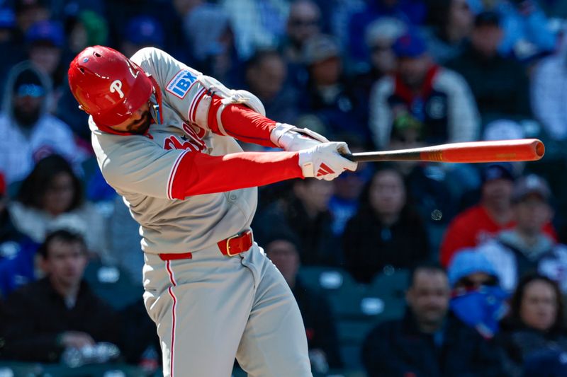 Apr 26, 2025; Chicago, Illinois, USA; Philadelphia Phillies right fielder Nick Castellanos (8) singles against the Chicago Cubs during the fourth inning at Wrigley Field. Mandatory Credit: Kamil Krzaczynski-Imagn Images
