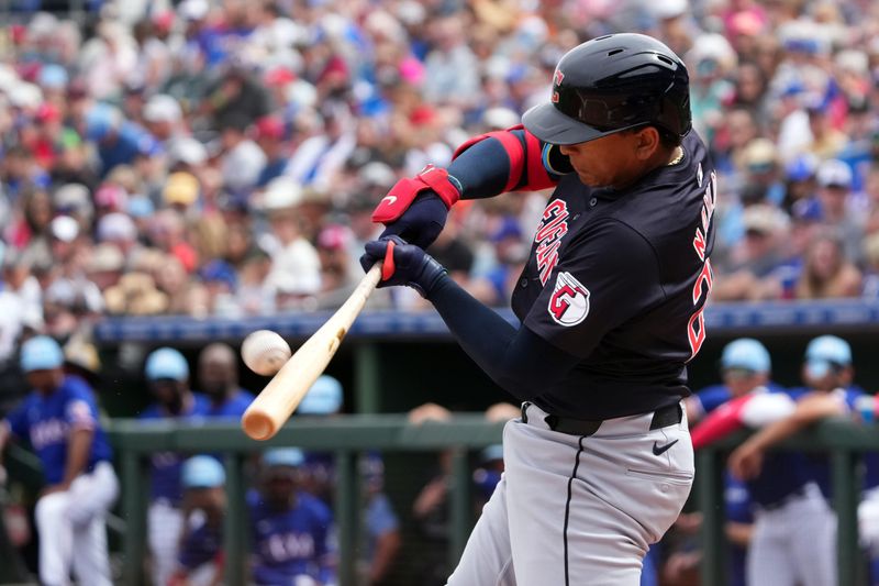 Mar 12, 2024; Surprise, Arizona, USA; Cleveland Guardians catcher Bo Naylor (23) bats against the Texas Rangers during the first inning at Surprise Stadium. Mandatory Credit: Joe Camporeale-USA TODAY Sports