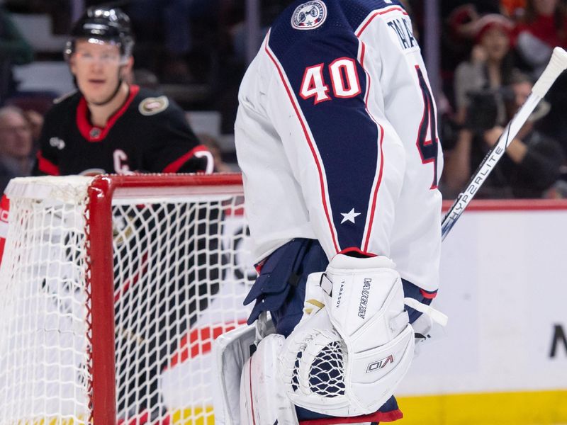 Feb 13, 2024; Ottawa, Ontario, CAN; Columbus Blue Jackets goalie Daniil Tarasov (40) reacts to a goal scored by Ottawa Senators left wing Brady Tkachuk (7) in the first period at the Canadian Tire Centre. Mandatory Credit: Marc DesRosiers-USA TODAY Sports